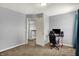 Comfortable bedroom with desk and natural light from the window at 3101 Woodhaven Way, Bargersville, IN 46106