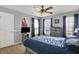 Charming bedroom featuring a ceiling fan and lots of natural light at 3101 Woodhaven Way, Bargersville, IN 46106