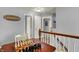 Hallway with chess table and overhead light fixture and multiple doorways at 3101 Woodhaven Way, Bargersville, IN 46106