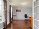 Office space with hardwood floors, natural light, desk, chair and American flag at 3101 Woodhaven Way, Bargersville, IN 46106
