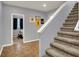Carpeted staircase leading to upper level, providing easy access to bedrooms and living areas at 3101 Woodhaven Way, Bargersville, IN 46106