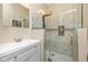 Modern bathroom with a sleek vanity and glass-enclosed shower featuring beautiful tile work at 3113 Sandpiper N Dr, Indianapolis, IN 46268