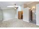 Spacious main bedroom features vaulted ceilings, a ceiling fan, and plenty of natural light at 3113 Sandpiper N Dr, Indianapolis, IN 46268