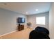 Finished basement with a TV, keyboard, and beanbag chairs for relaxing at 3561 Shady Lk Dr, Westfield, IN 46074