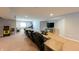 Finished basement featuring a home theater area, game area, and neutral carpeting at 3561 Shady Lk Dr, Westfield, IN 46074