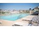 A refreshing community pool surrounded by lounge chairs, providing a relaxing and social gathering space at 3561 Shady Lk Dr, Westfield, IN 46074