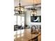 Kitchen island with granite countertops and elegant lighting at 3561 Shady Lk Dr, Westfield, IN 46074