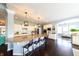Spacious kitchen with large island, stainless appliances, and dark hardwood flooring at 3561 Shady Lk Dr, Westfield, IN 46074