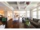Spacious living room with hardwood floors and an open kitchen concept at 3561 Shady Lk Dr, Westfield, IN 46074