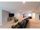 Finished basement featuring a home theater, a large television, and comfortable seating at 3561 Shady Lk Dr, Westfield, IN 46074