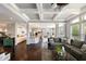 Open floor plan with a modern kitchen, dining area, and living room featuring hardwood floors at 3561 Shady Lk Dr, Westfield, IN 46074
