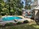 Inviting backyard pool and patio area, perfect for outdoor entertaining and relaxation at 3948 S Woodfield Dr, New Palestine, IN 46163