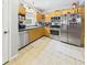 Bright kitchen with stainless steel appliances and tile flooring at 4079 S 50 W, Anderson, IN 46013
