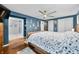 Cozy bedroom with hardwood floors and easy access to the bathroom and closet space at 4291 E Lakeview Dr, Martinsville, IN 46151