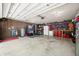 Well-equipped garage with organized storage solutions, tools, and ample workspace for hobbies and vehicle maintenance at 4291 E Lakeview Dr, Martinsville, IN 46151