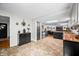 Spacious kitchen with tile floors, butcher block countertops, stainless steel appliances, and access to living space at 4291 E Lakeview Dr, Martinsville, IN 46151