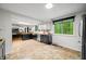 Charming kitchen with tile floors, butcher block countertops, stainless steel appliances, and ample natural light at 4291 E Lakeview Dr, Martinsville, IN 46151