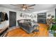 Inviting living room features a brick fireplace, comfortable seating and a ceiling fan at 4291 E Lakeview Dr, Martinsville, IN 46151
