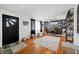 Spacious living room with hardwood floors, vintage decor and natural light at 4291 E Lakeview Dr, Martinsville, IN 46151