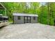 Modern outbuilding on a gravel area offering additional storage space and functionality at 4291 E Lakeview Dr, Martinsville, IN 46151