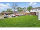 Expansive lawn area showcasing off-street parking, fenced area, and patio seating at 4730 Rookwood Ave, Indianapolis, IN 46208