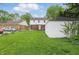 View of the property showing a spacious lawn area with detached garage at 4730 Rookwood Ave, Indianapolis, IN 46208