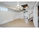 This finished basement has painted white walls, cement floor, and is ready for customization at 4730 Rookwood Ave, Indianapolis, IN 46208