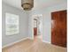 Bedroom featuring hardwood floors, and a large window for natural light at 4730 Rookwood Ave, Indianapolis, IN 46208