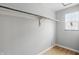 Walk-in closet with shelf and wood flooring and window at 4730 Rookwood Ave, Indianapolis, IN 46208