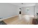 Inviting living room with hardwood floors and a glimpse into the next room at 4730 Rookwood Ave, Indianapolis, IN 46208