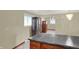 Sunlit dining room featuring tile floors, storage cabinet, and windows offering great natural light at 5027 E 40Th St, Indianapolis, IN 46226