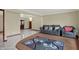This inviting living area showcases a stylish couch, elegant decor, and tiled floors at 5027 E 40Th St, Indianapolis, IN 46226