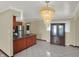 Charming open concept with a kitchen, granite counters, and decorative lighting at 5027 E 40Th St, Indianapolis, IN 46226