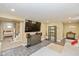 Finished basement area features a large tv and cozy seating at 5526 Indianola Ave, Indianapolis, IN 46220
