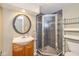 Bathroom offers shower with sliding door and a pedestal sink at 5526 Indianola Ave, Indianapolis, IN 46220