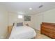 Basement bedroom with neutral walls offers a relaxing space at 5526 Indianola Ave, Indianapolis, IN 46220