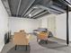 Finished basement area featuring a seating area, neutral decor, and drop ceiling at 5851 Grand Ave, Plainfield, IN 46168