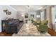 Comfortable living room with plush seating, stylish decor, and abundant natural light at 5851 Grand Ave, Plainfield, IN 46168