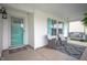Inviting front porch with seating, charming decor, and a swing at 610 Redwood Dr, Pendleton, IN 46064