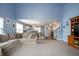 Open-concept living room with view to kitchen and dining areas at 610 Redwood Dr, Pendleton, IN 46064
