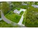 Aerial view of a well maintained home with a manicured lawn at 6250 Seminole Dr, Indianapolis, IN 46259