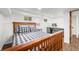 Basement bedroom with a bed, desk, and stylish decor at 6250 Seminole Dr, Indianapolis, IN 46259