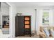 Stylish living room featuring built-in storage and views of the open floorplan at 6250 Seminole Dr, Indianapolis, IN 46259