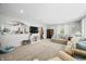 Open-concept living room with recessed lighting, neutral paint, and plush carpet, perfect for entertaining at 6250 Seminole Dr, Indianapolis, IN 46259