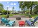 Backyard patio area with chairs and a firepit at 6288 Buttonwood Dr, Noblesville, IN 46062