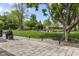 Landscaped backyard featuring a built in BBQ and patio, perfect for outdoor entertaining at 6288 Buttonwood Dr, Noblesville, IN 46062