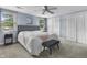 Comfortable bedroom with a ceiling fan, two windows and spacious closets at 6288 Buttonwood Dr, Noblesville, IN 46062