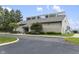 Community clubhouse featuring a neutral color palette, clerestory windows, manicured landscaping and ample parking at 6288 Buttonwood Dr, Noblesville, IN 46062