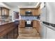 Modern kitchen with stainless steel appliances, stylish backsplash, and a wooden island at 6288 Buttonwood Dr, Noblesville, IN 46062