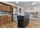 Spacious kitchen with stainless steel appliances, wood cabinets, and a central island at 6288 Buttonwood Dr, Noblesville, IN 46062